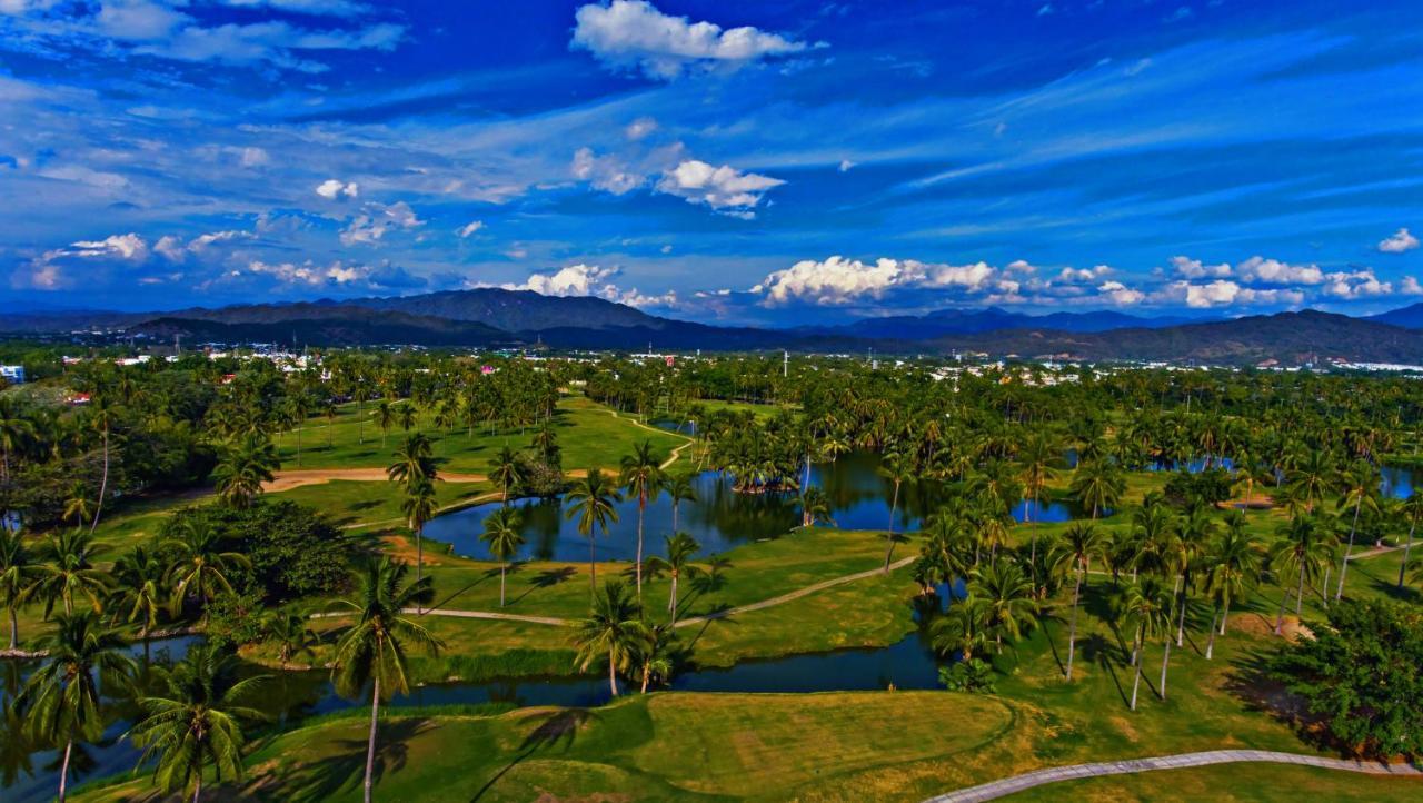 Las Hadas By Brisas مانزانيلو المظهر الخارجي الصورة Golf course in Samanà